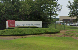 A Google Street View image of the entrance to Owens Corning's facility in Fort Smith