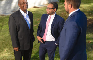 In this file photo, Dr. Carl Johnson of 2600 Holdings of Little Rock, left, speaks with Abtin Mehdizadegan, center, and Brett Taylor, right, attorneys with Cross Gunter Witherspoon & Galchus P.C.
