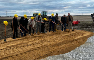 Olympus Construction executives and Missisippi County officials break ground on the Riverback Estates housing development in Osceola on Nov. 16, 2022