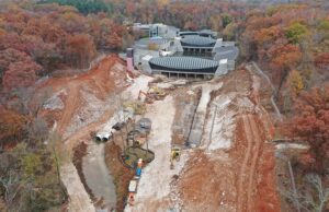 This aerial photo shows some of the groundwork that has taken place to prepare the grounds of the museum for its 100,000-SF expansion.