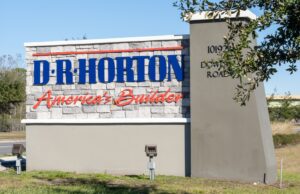 Signage at a D.R. Horton corporate office in Orlando, Florida. The nation's biggest home builder has acquired Riggins Custom Homes of Fayetteville, expanding its presence in the northwest Arkansas market.
