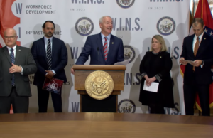 Arkansas Gov. Asa Hutchinson speaks at the Arkansas State Capitol about the release of the Governor's Council on Future Mobility report on Dec. 8, 2022