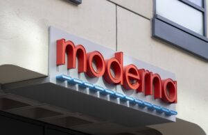 Cambridge, MA, USA - June 29, 2022: Moderna logo is seen at the entrance to its headquarters in Cambridge, Massachusetts. Moderna, Inc., is an American pharmaceutical and biotechnology