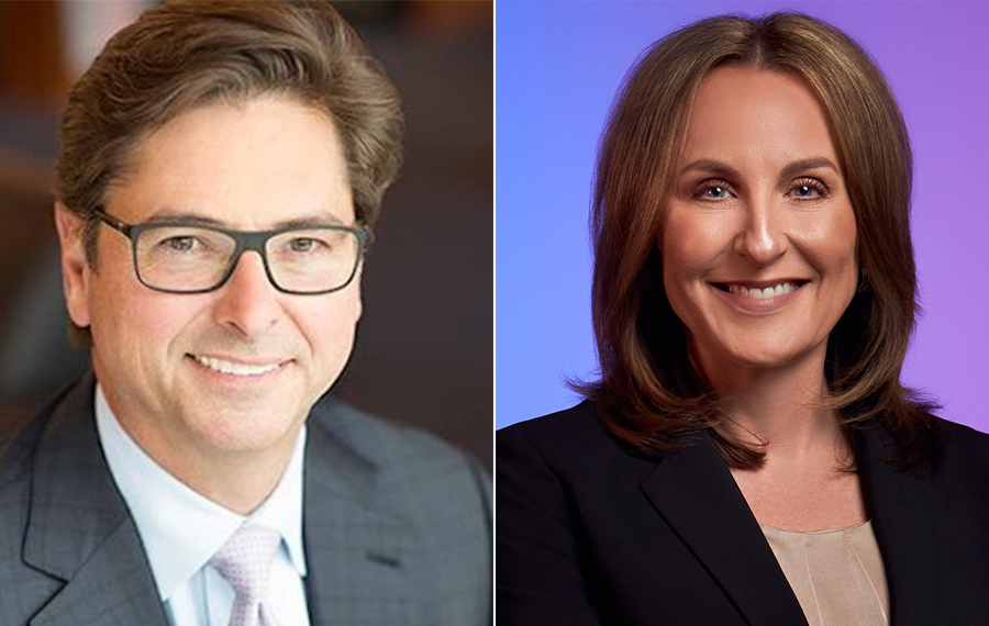 J.B. Hunt CEO John Roberts III, left, and President Shelley Simpson