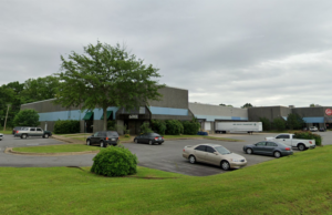 A Google Street View image of the warehouse at 6001 Lindsey Road in Little Rock