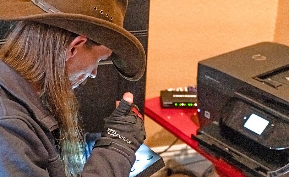 A high-speed broadband technician in northwest Arkansas connects one of OzarksGo’s 35,000 customers.