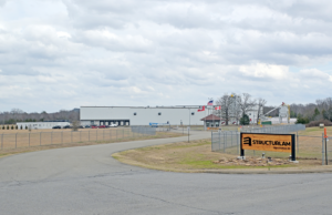 The entrance to Structurlam Mass Timber Corp.'s facility in Conway. Operations at the plant were suspended in January after the company lost a production contract with Walmart.
