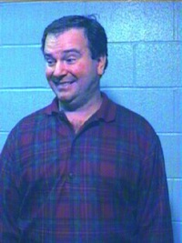 Jeffrey Scott "Jeff" Rand, shown in a 2003 booking photo taken by the Garland County Sheriff's Department, when he was arrested for aggravated assault.