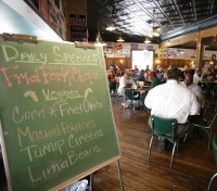 Though the atmosphere is unassuming and the food is simple, Cotham's in the City is billed as "where the elite meet to eat."