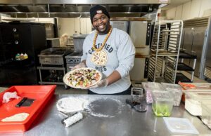 Harlem Wilson, a co-owner with Kreg and Samantha Stewart of Certified Pies in Little Rock, loves making pizza, a love that has grown into a restaurant business.