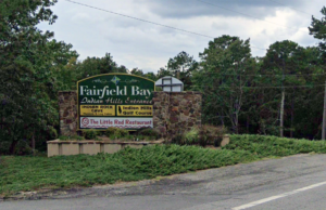 A sign welcomes visitors to the Indian Hills entrance of Fairfield Bay in this Google Street View image