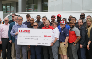 Landers Auto Group presents a check for $50,000 to Arkansas Food Bank