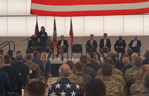 Gov. Sarah Huckabee Sanders speaks to a crowd at Ebbing Air National Guard Base in Fort Smith on May 5, 2023