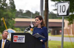 Arkansas Highway Commission member Marie Holder speaks a ceremony marking the completion of an $81 million project to widen Cantrell Road in Little Rock