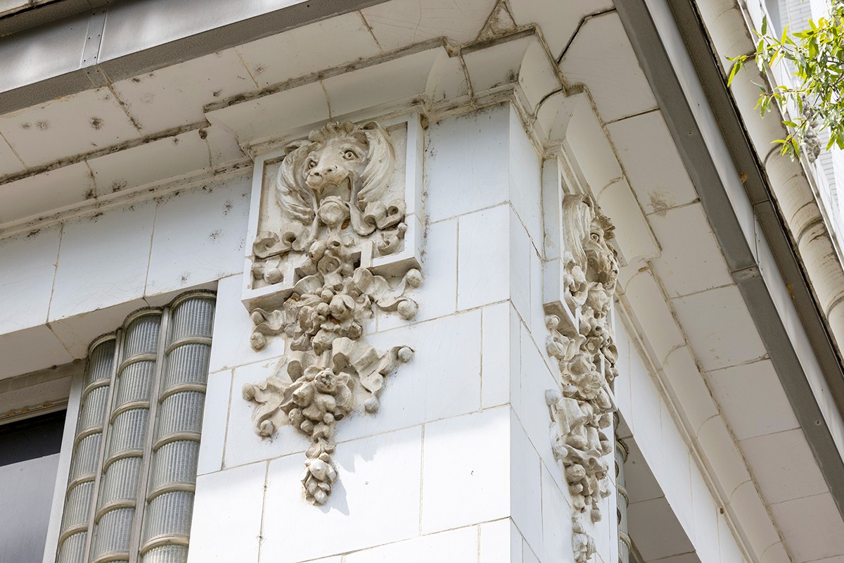 The historic Boyle Building features terra-cotta flourishes on its glazed brick exterior.