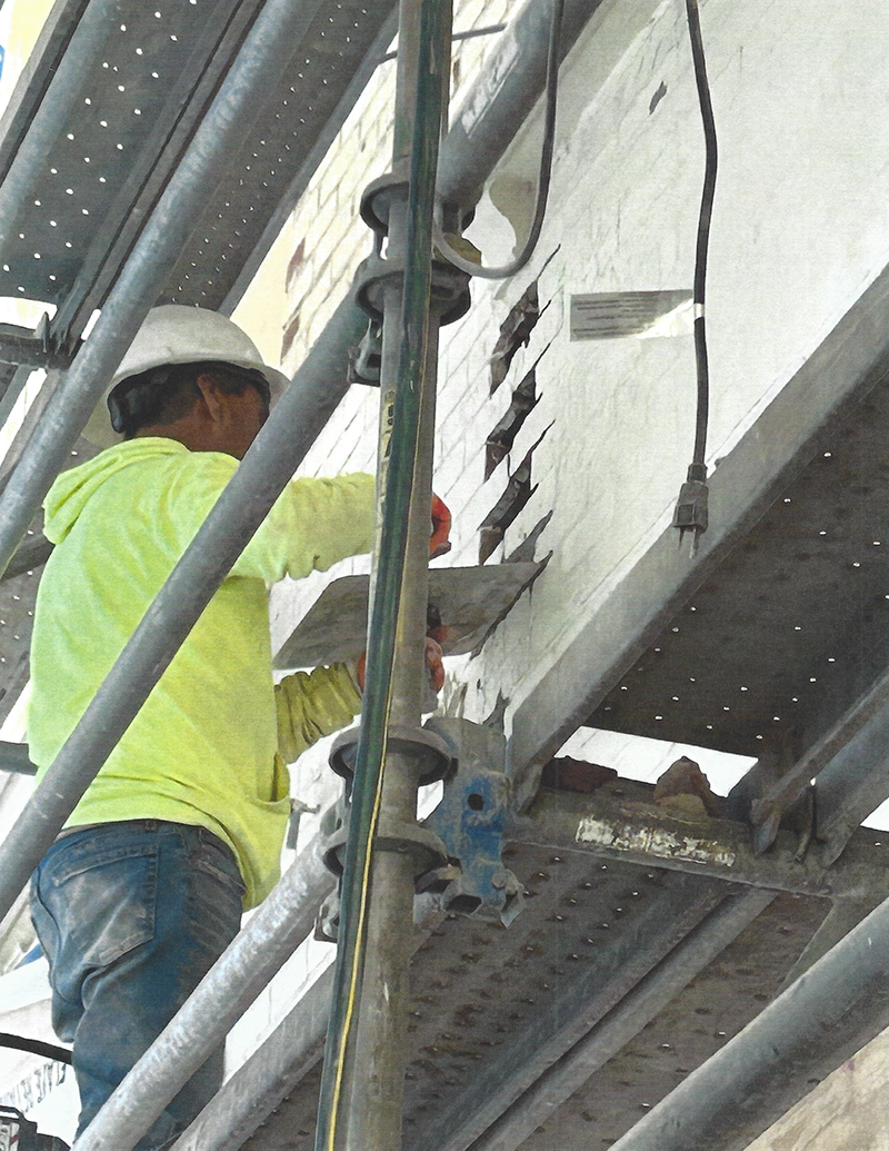 Replacing individual bricks is part of the meticulous historic restoration work.