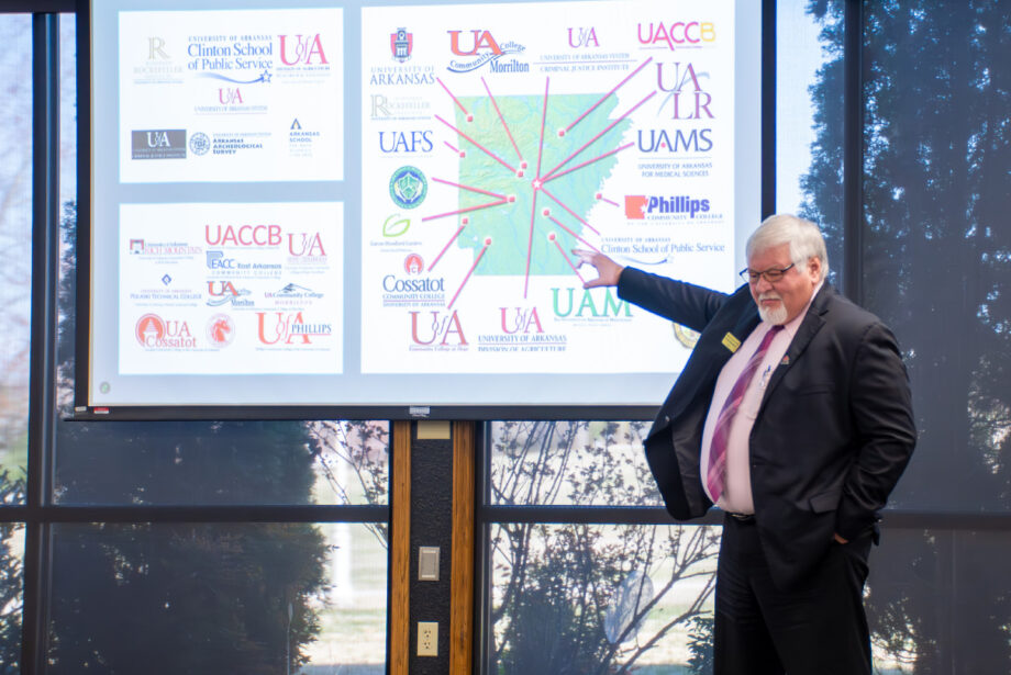 Northark President Rick Massengale with a map of all campuses affiliated with the University of Arkansas System. [PHOTO provided]