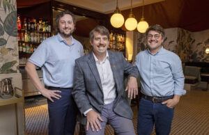 David Hesselbein, left, Greg Baber and Wes Mickel, the daily operating partners of the Barnaby Group, at George’s restaurant in Little Rock’s Heights neighborhood, one of the projects of the hospitality company.[Karen E. Segrave]