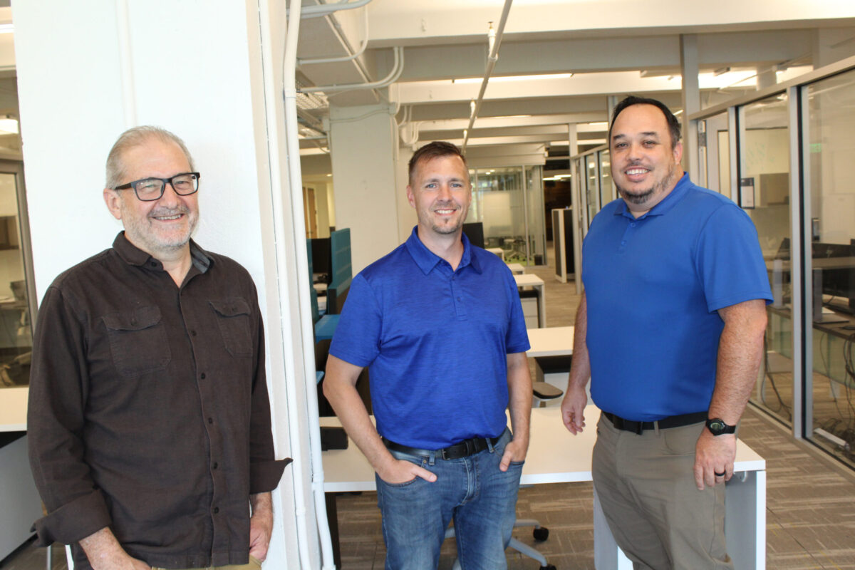 From left, Mike Steely, chief revenue officer, Scott Roper, vice president of business development and COO; and Nathan Myers, CEO and president, all from AccuCode AI Inc. [Mark Friedman]