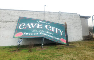 In March, a tornado with 165-mph winds plowed through Cave City, a northeast Arkansas town known for its watermelons. At right, a pile of coffins marked the location of a storage building behind Qualls Funeral Home in Cave City. [gwen moritz]