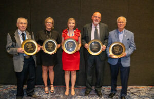 Tom Nichols, Heather Knight Loftis, Brooke Buckner, Jay Bunyard and Sid King. Loftis and Buckner represented their late fathers, Bob Knight and Ed Buckner. [PHOTO provided]