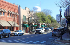 A snapshot of downtown El Dorado and its arts district, including artsy and quaint buildings bunched together on the main street.