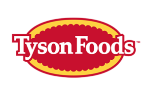 An oval logo with a yellow border and smaller red scalloped oval in the middle, the words Tyson Foods are on top of the oval in a white font with red border
