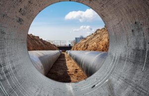 A photo from inside a large water pipe.